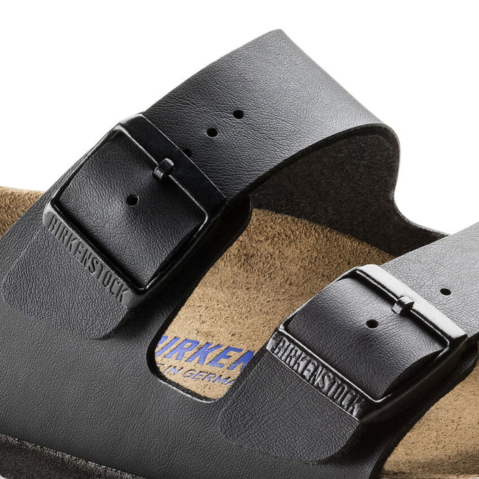 Birkenstock Arizona Soft Footbed Birko-Flor® sandals in black with adjustable buckles and soft suede footbed, close-up view.