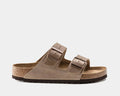 Birkenstock Arizona Soft Footbed Oiled Leather sandals in taupe featuring dual adjustable straps with metal buckles and contoured cork-latex footbed, side view.