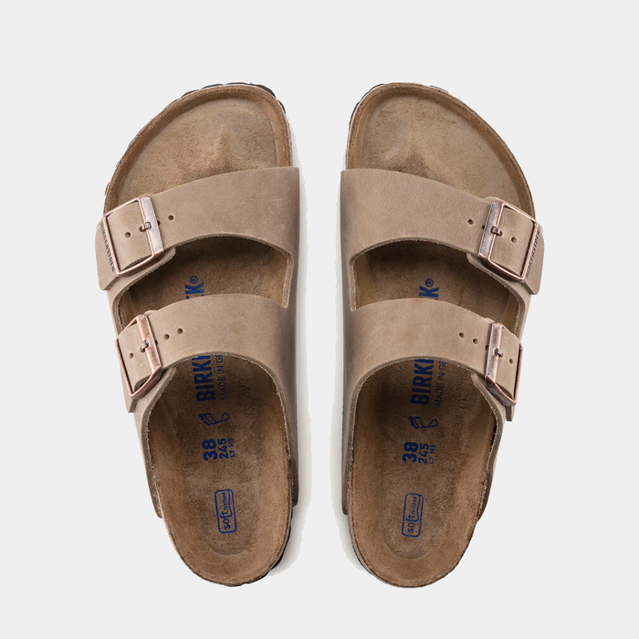 Birkenstock Arizona Soft Footbed Oiled Leather sandals in brown with dual adjustable straps and copper buckles, top view.