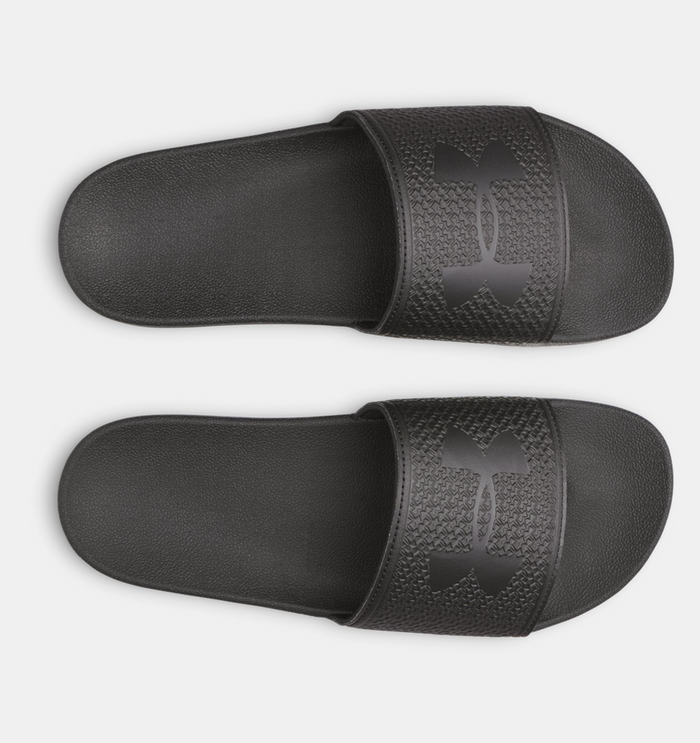 Under Armour ARMR Slide sandals in black with textured strap and logo, top view.