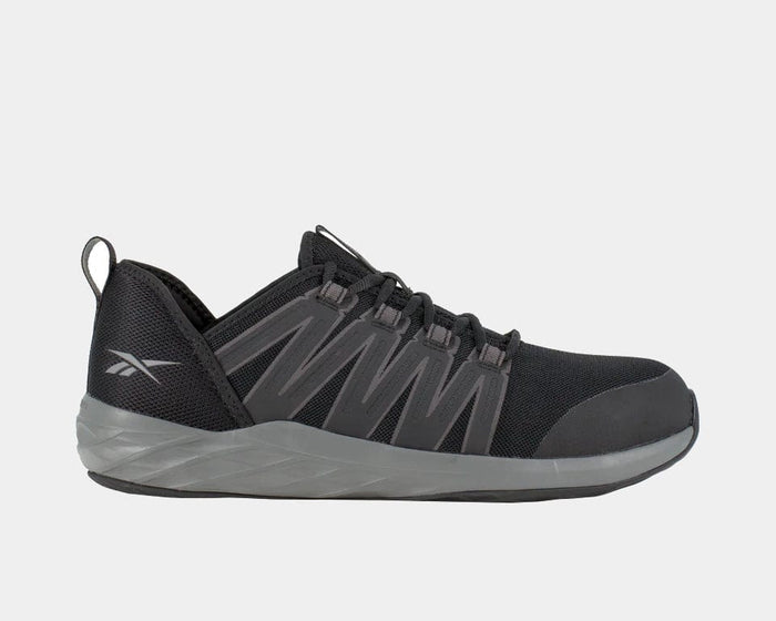 Reebok Work Astroride Work shoes in black with gray accents, mesh upper, reinforced toe, and durable outsole, side view.
