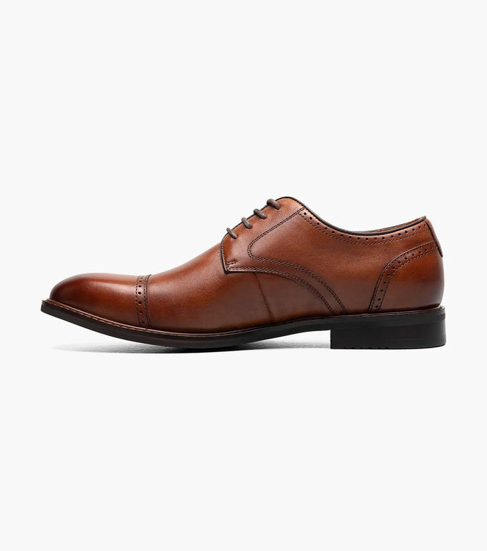 Stacy Adams Bailey Cap Toe dress shoes in cognac brown leather with perforated detailing and cap toe design, side view.