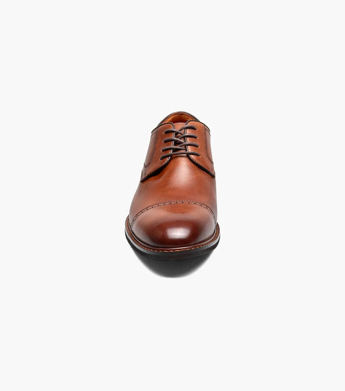 Stacy Adams Bailey Cap Toe dress shoe in cognac leather with sleek stitching and lace-up closure, front view.