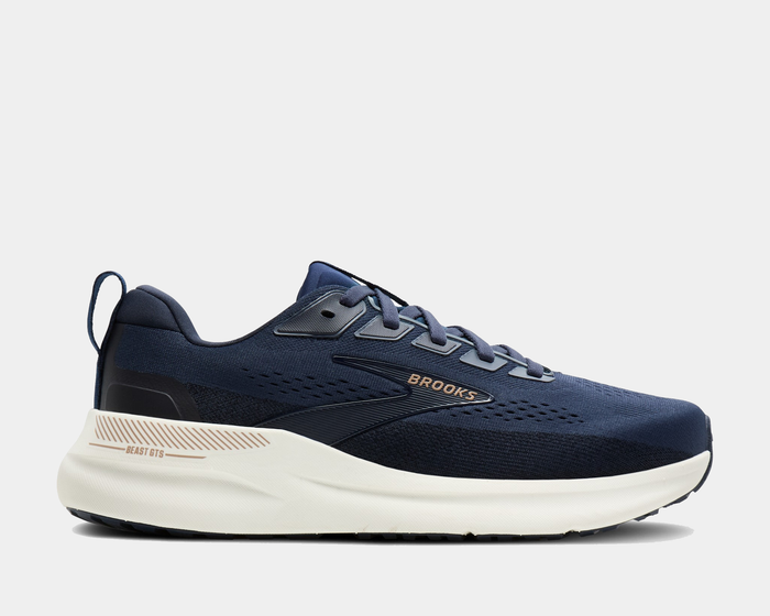 Brooks Beast GTS 26 running shoes in navy blue with engineered mesh upper, GuideRails support system, and cushioned midsole, side view.