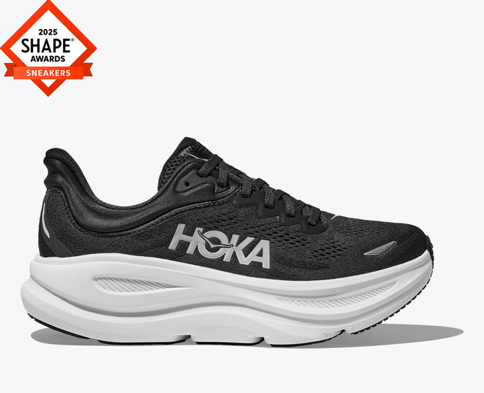 HOKA Bondi 9 running shoes in black with breathable mesh upper, cushioned EVA midsole, and white outsole, side view.