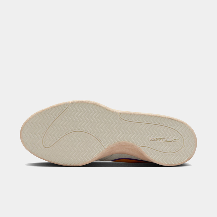 Nike Book 1 Decade shoes outsole featuring textured herringbone pattern in cream, sole/bottom view.