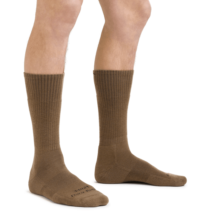 Darn Tough Boot Midweight Tactical Sock with Cushion in brown, ribbed height and cushioned footbed, worn by model