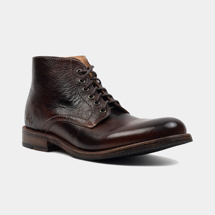 Bed Stu Bradley boots in dark brown full-grain leather with lace-up design, textured finish, and stacked wooden heel, front side angle.