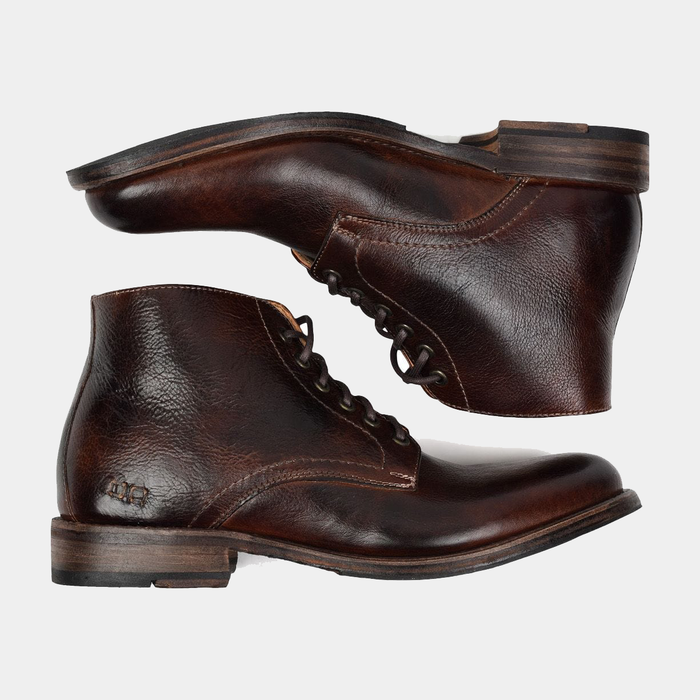 Bed Stu Bradley boots in rich brown leather with distressed finish, lace-up design, and stacked wooden heel, side view.