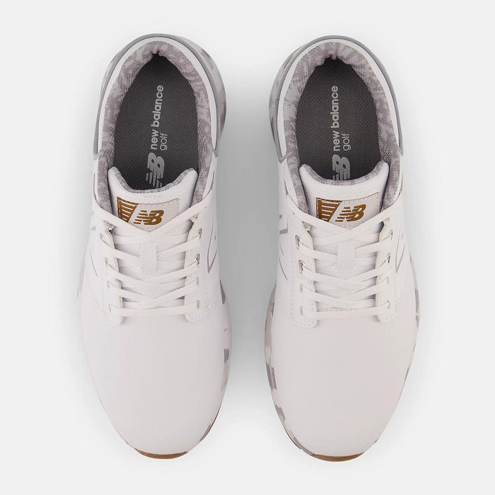 New Balance Golf Brighton Golf shoes in white with gold logo detailing and gray inner lining, top view showing lace-up closure.