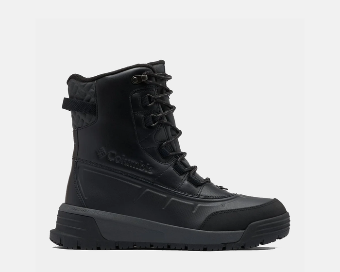 Columbia Bugaboot™ Celsius winter boots in black with waterproof leather upper, quilted ankle, and rugged rubber outsole, side view.