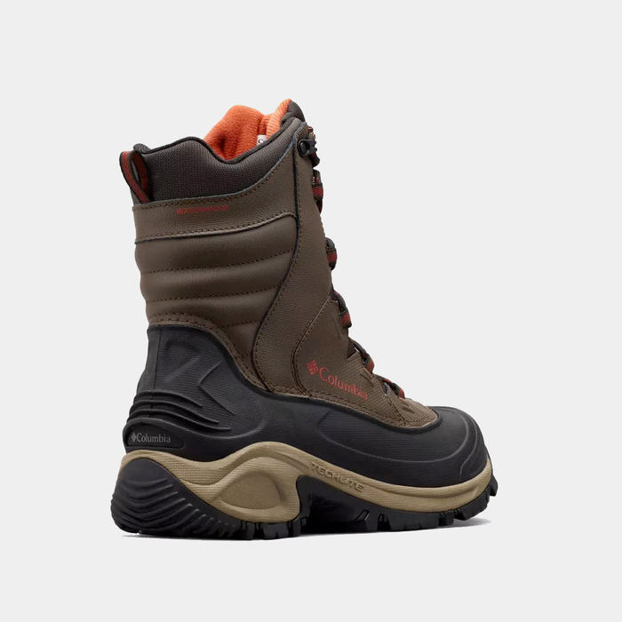 Columbia Bugaboot III winter boots in brown with black and tan soles, waterproof leather upper, side view.