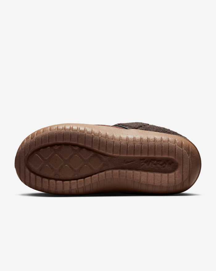 Nike Burrow SE slippers outsole view featuring textured brown rubber with diamond-pattern grip and embossed branding.