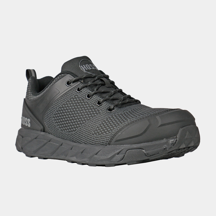 Hoss Buster Low work shoes in all-black with textured mesh upper, sturdy rubber outsole, lace-up design, and reinforced toe, front angle view.