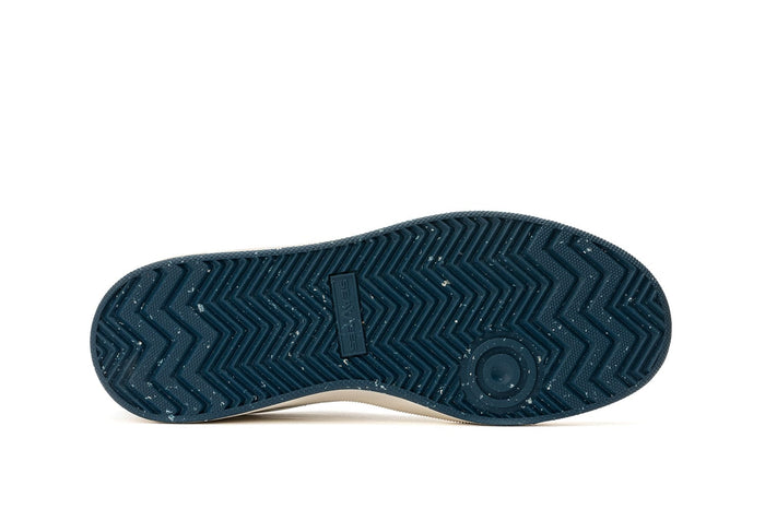 SeaVees Cardinal Sneaker outsole in navy blue rubber with herringbone tread pattern and circular pivot point detailing.