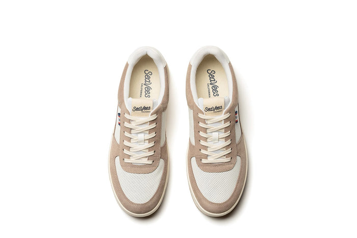 SeaVees Cardinal Sneaker in beige and white with suede accents and perforated toe box, top view.