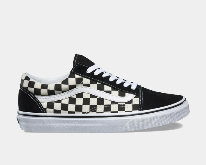 Vans Checkerboard Old Skool sneakers with black suede panels, white laces, and classic checkered canvas side design, side view.