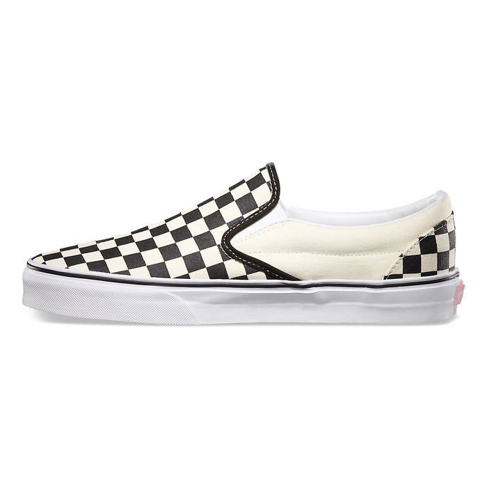 Vans Checkerboard Slip On shoes in black and white checkered canvas design with white rubber sole, side view