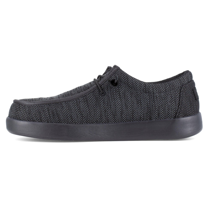 Volcom Chill Composite Toe Slip-On shoes in dark gray with textured mesh upper and slip-on design, side view.