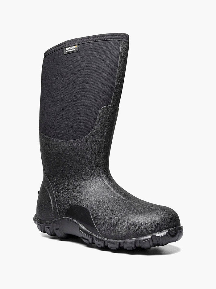 Bogs Classic High boots in black with waterproof construction and textured rubber outsole, side angle view.