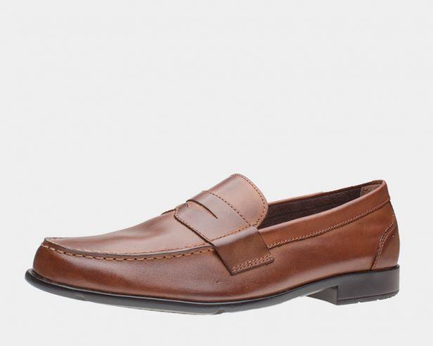 Rockport Classic Penny Loafers in brown leather with a polished finish, stitched detailing and low heel, side view.