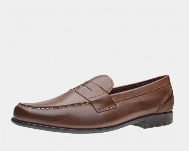 Rockport Classic Penny Loafers in brown leather with stitched details and slip-on design, side view.
