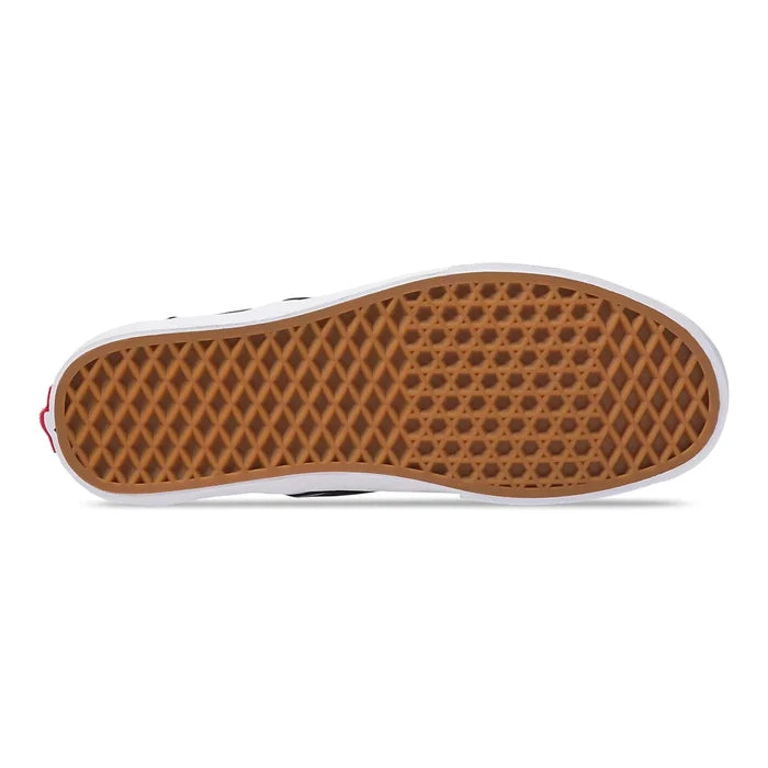 Vans Classic Slip On shoes outsole with signature waffle tread pattern in gum rubber, bottom view.