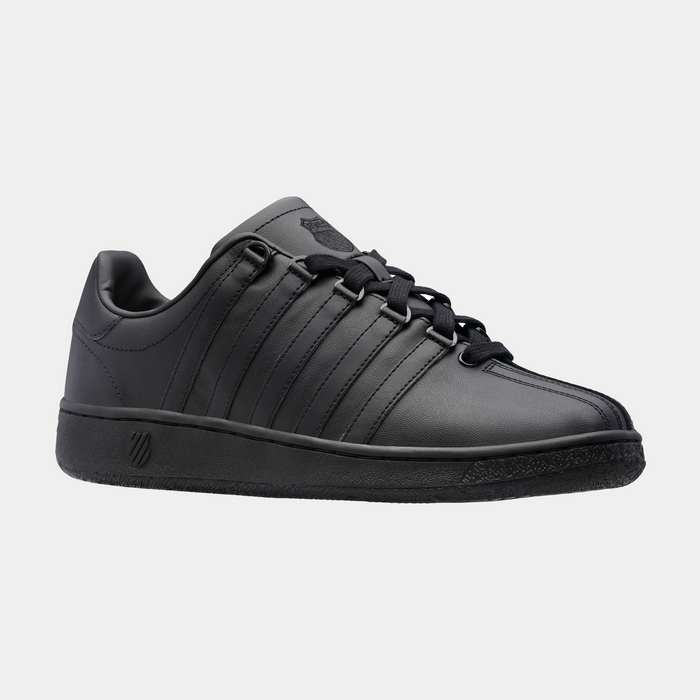 K-Swiss Classic VN sneakers in all-black leather with signature five-stripe design and lace-up closure, side view.