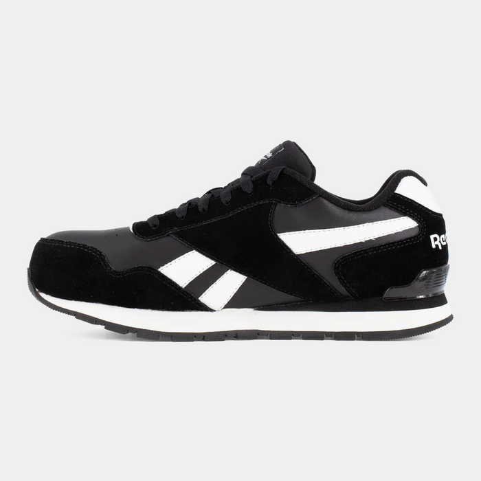 Reebok Work Classic Work Sneaker in black and white with suede and leather upper, side view.