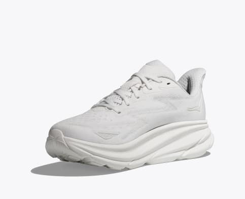 HOKA Clifton 9 running shoes in all-white with lightweight mesh upper and cushioned midsole, side-front view.