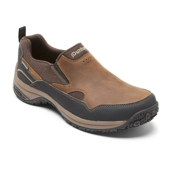 Dunham Cloud Plus Waterproof Slip-On shoes in brown leather and black accents, slip-on design with durable rubber outsole, angled front view.