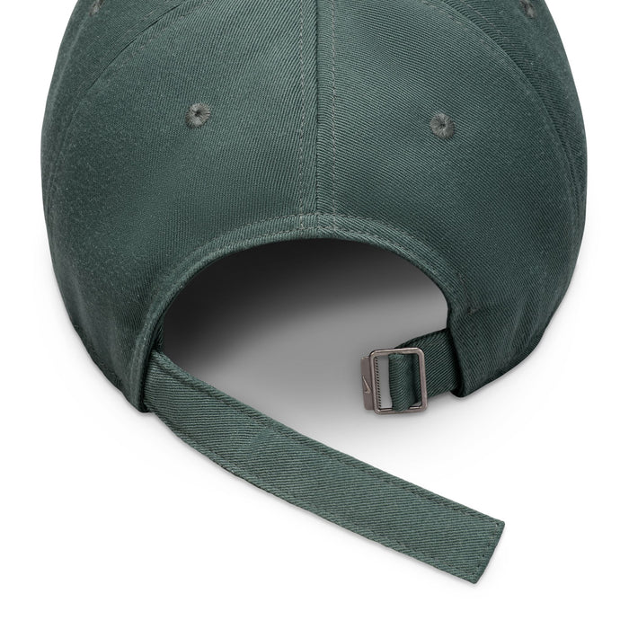 Nike Club Hat in dark green, back view showing adjustable strap and durable stitched fabric.