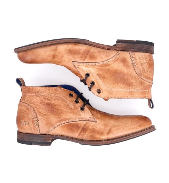 Bed Stu Clyde Chukka boots in tan leather with textured details and sturdy rubber sole, side view.