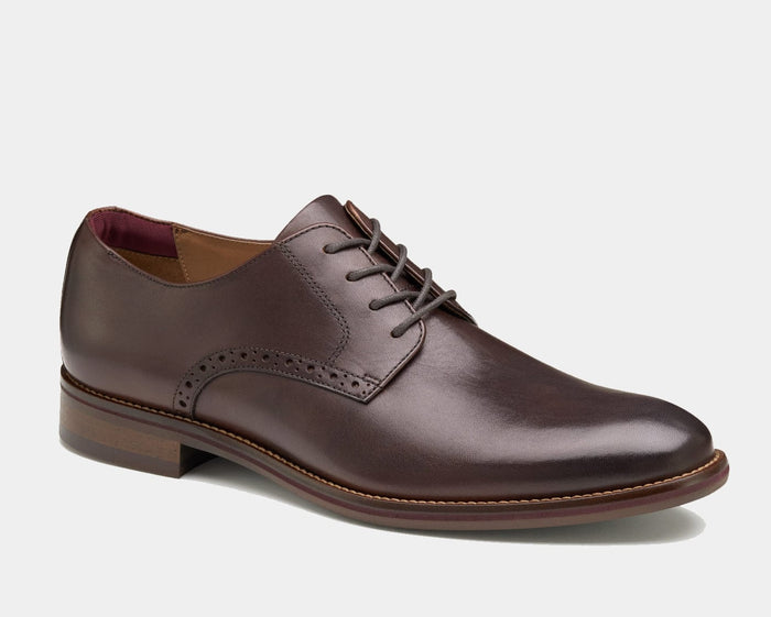 Johnston & Murphy Conard 2.0 Plain Toe shoes in dark brown leather with brogue detailing and stacked heel, side view.