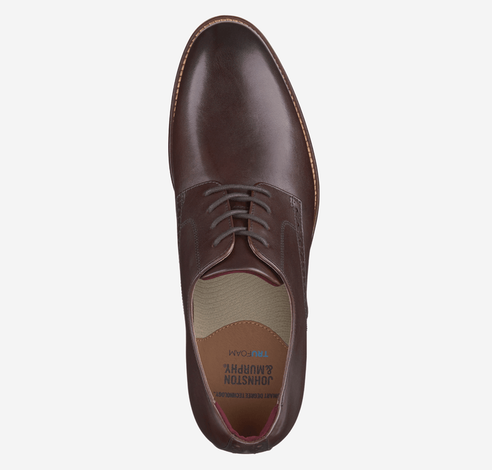 Johnston & Murphy Conard 2.0 Plain Toe shoe in dark brown leather, featuring a sleek plain toe design and lace-up closure, top view.