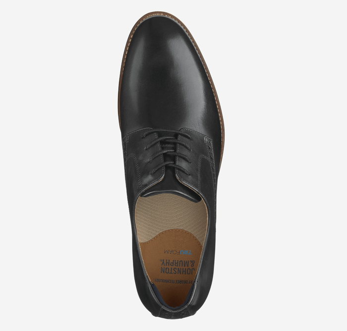 Johnston & Murphy Conard 2.0 Plain Toe dress shoe in black leather with lace-up closure and cushioned insole, top view.