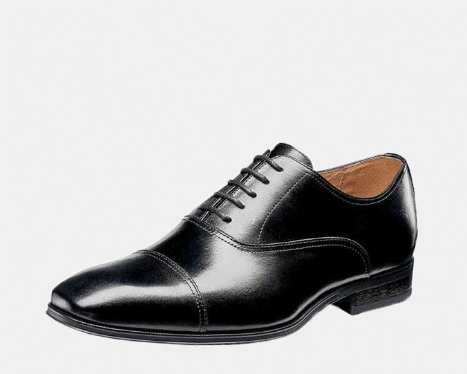 Florsheim Corbetta dress shoes in black leather with cap toe design and lace-up closure, side view.