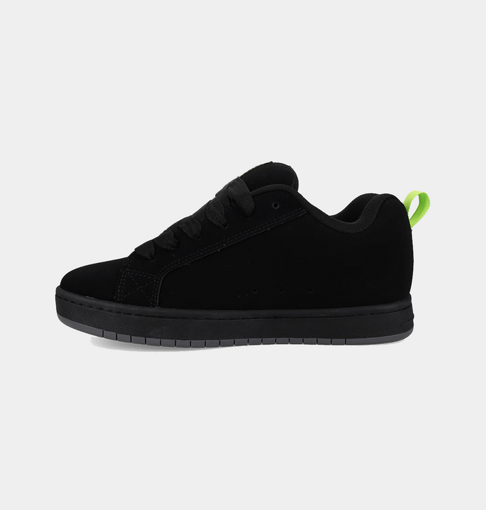 DC Footwear Court Graffik shoes in black with suede upper, tonal black sole, and neon green heel tab, side view.