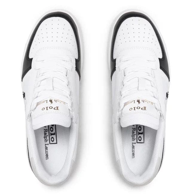 Polo Ralph Lauren Court PP sneakers in white and black with perforated toe box and gold branding on tongue, top view.