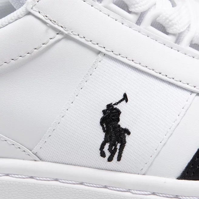 Polo Ralph Lauren Court PP sneakers with white leather upper and embroidered black polo logo detail, side view.