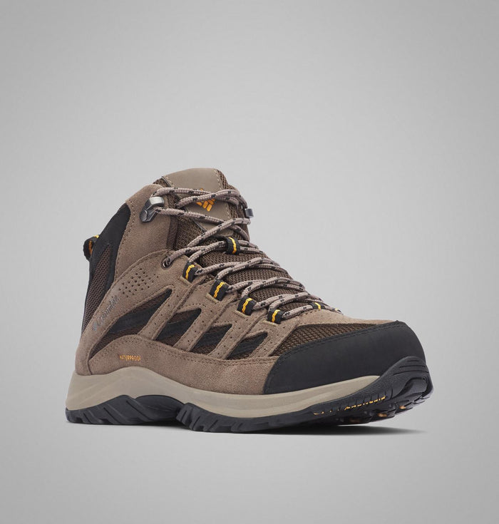 Columbia Crestwood Mid Waterproof hiking boots in brown with suede upper, black toe cap, and durable outsole, front angle view.