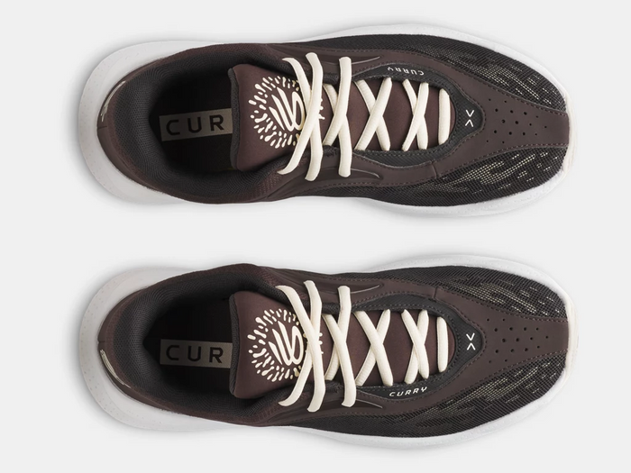 Under Armour Curry Splash 25 basketball shoes top view showing dark brown mesh upper, cream laces, and branded tongue detail.