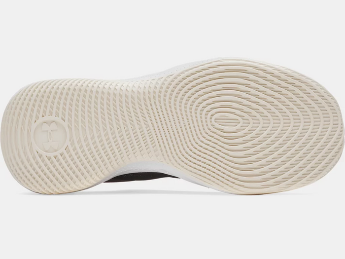 Under Armour Curry Splash 25 basketball shoes outsole with concentric traction pattern in off-white rubber, bottom view