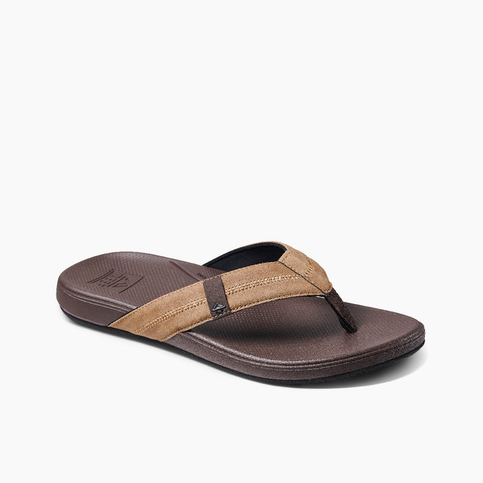 Reef Cushion Phantom 2.0 sandals with brown synthetic straps and cushioned brown footbed, angled side view.