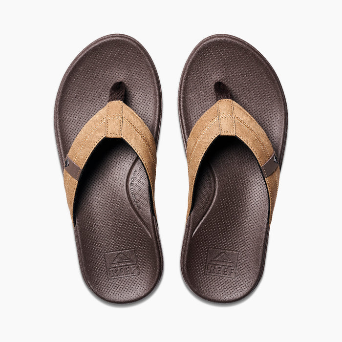 Reef Cushion Phantom 2.0 sandals in brown with tan fabric straps and textured footbed, top view.