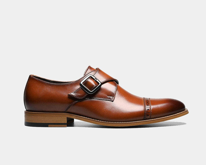 Stacy Adams Desmond Cap Toe Monk Strap dress shoe in tan leather with buckle closure, perforated detailing, and wooden sole, side view.
