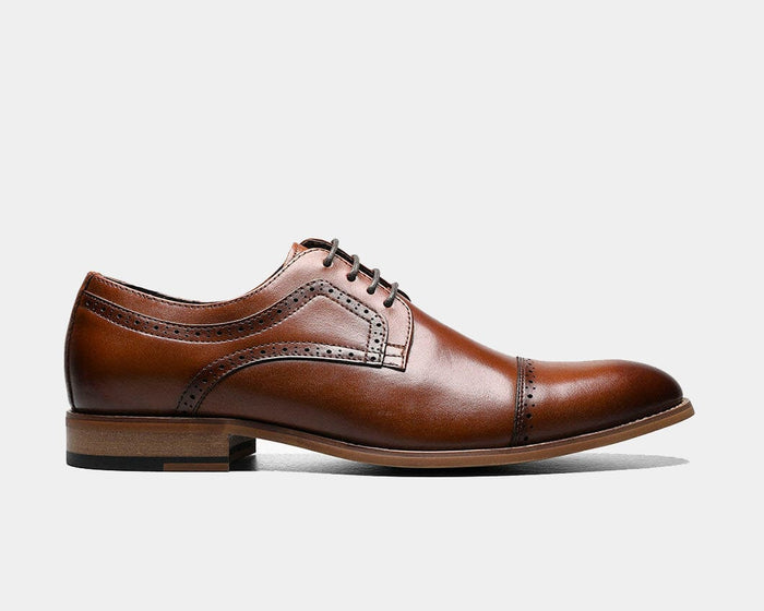 Stacy Adams Dickinson Cap Toe dress shoes in cognac brown leather with brogue detailing and stacked heel, side view.