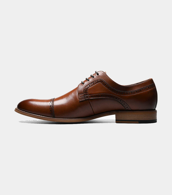 Stacy Adams Dickinson Cap Toe dress shoe in rich brown leather with brogue detailing and stacked wooden heel, side view.