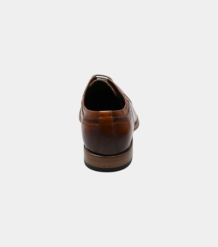 Stacy Adams Dickinson Cap Toe dress shoes in brown leather with decorative stitching, back view showcasing heel detail and stacked sole.