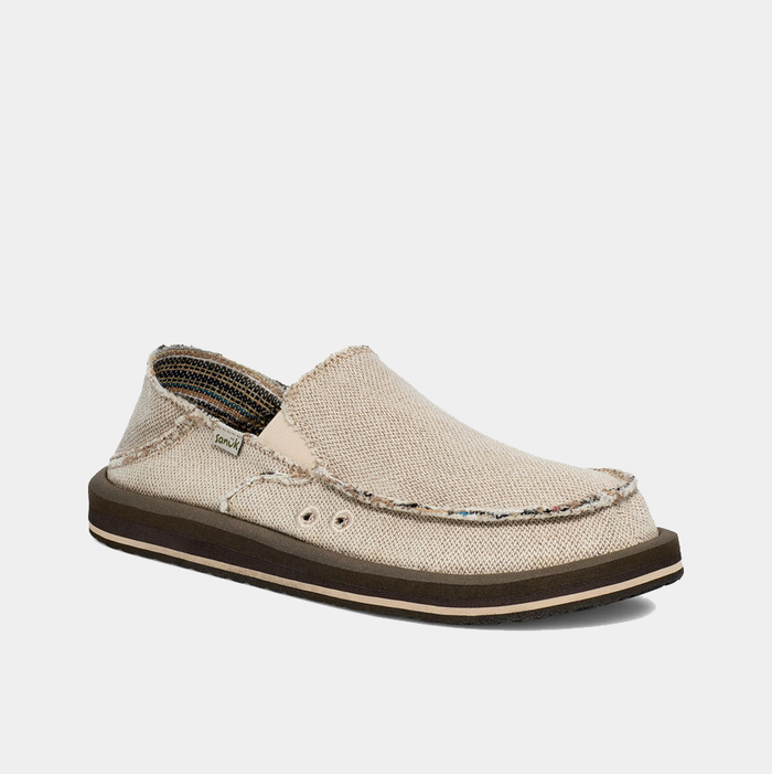 Sanuk Donny Hemp 2 Tone slip-on shoes in beige with frayed edges, breathable hemp upper, and cushioned brown outsole, side view.